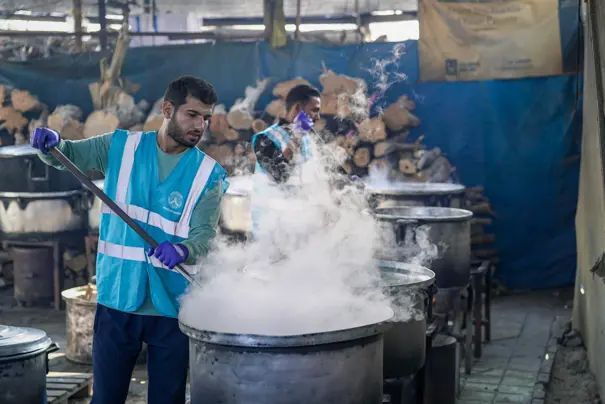 Volunteers serving hot meals